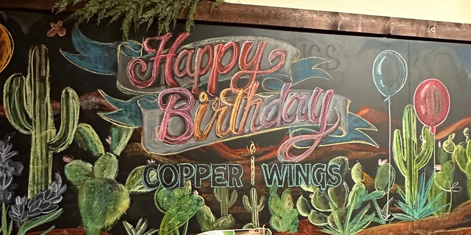 The same board with Happy Birthday, balloons and cactus
